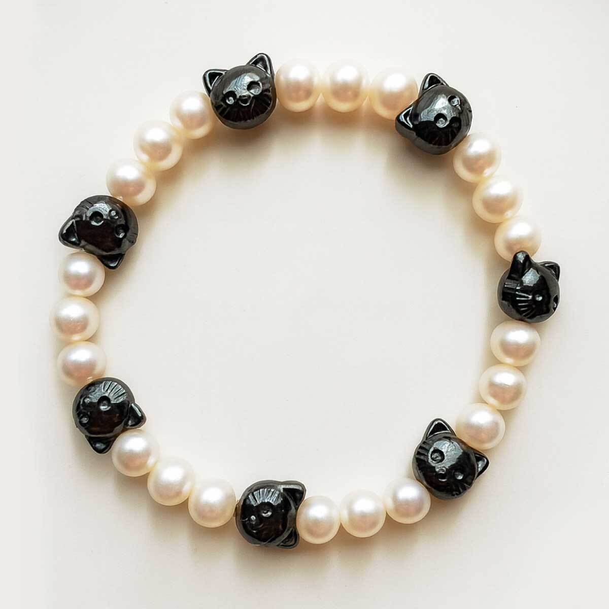 白珍珠黑磁貓手鍊|優雅守護安心陪伴