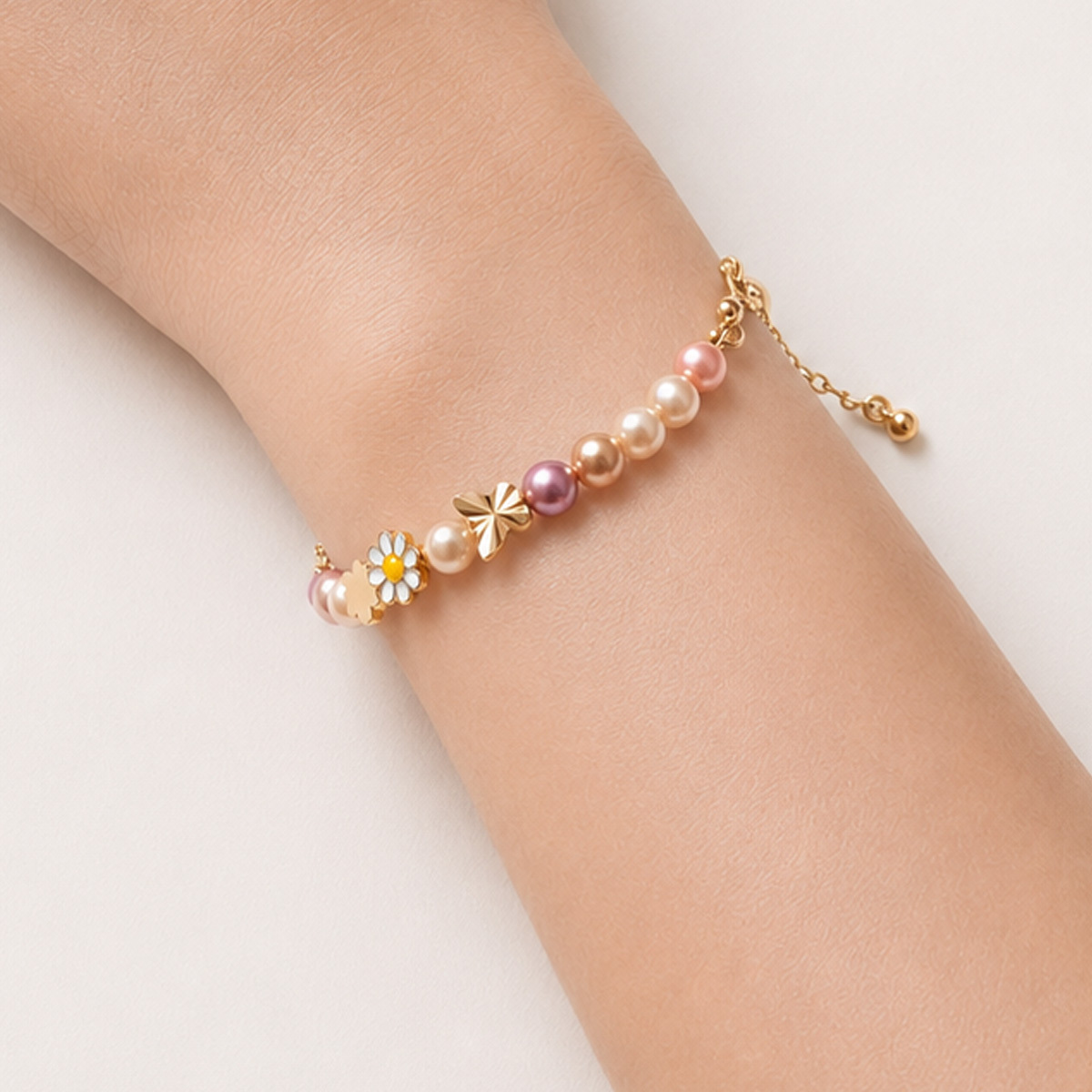 pastel-pearl-daisy-bracelet-worn-on-wrist