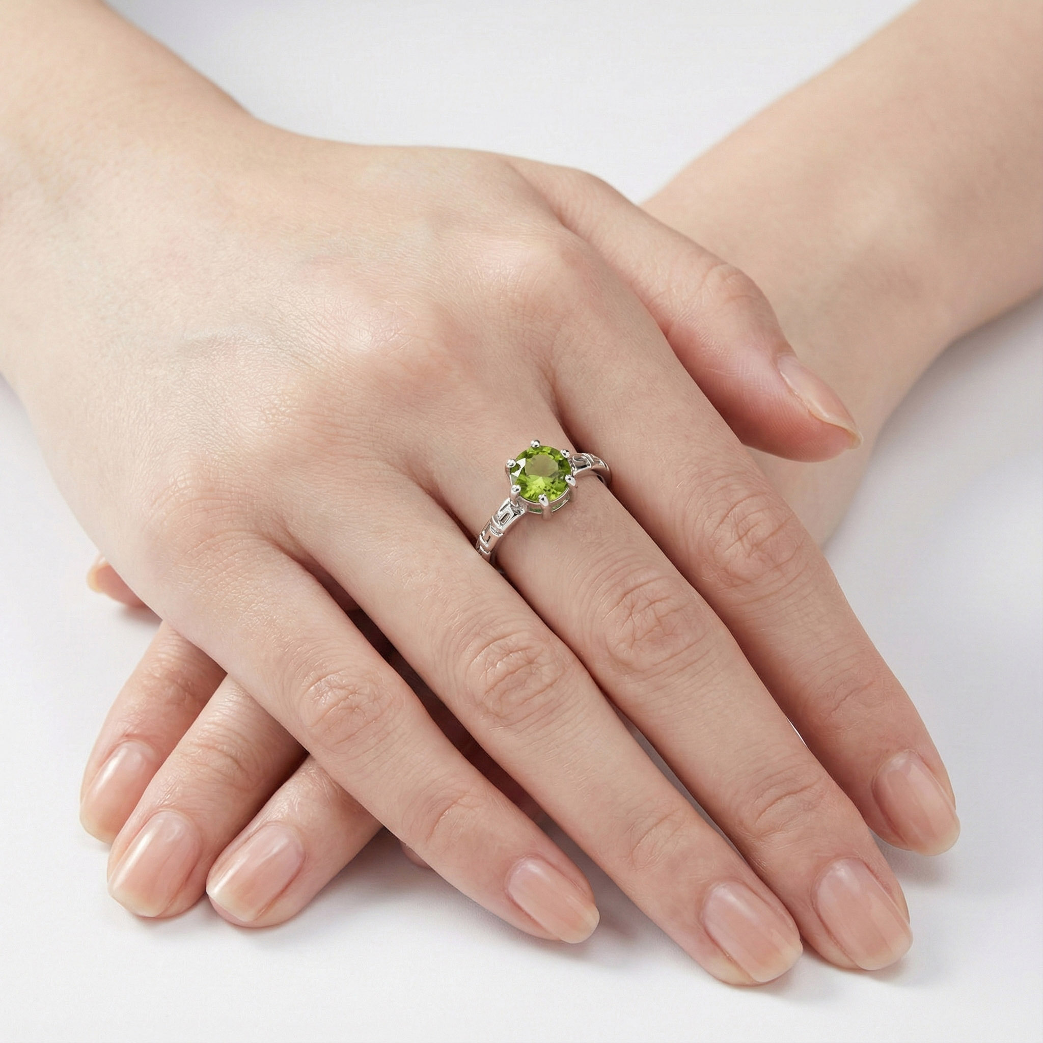 natural-peridot-ring-worn-hand-silver