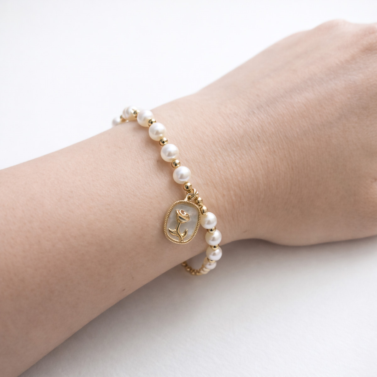 pearl-rose-charm-bracelet-hand-wear