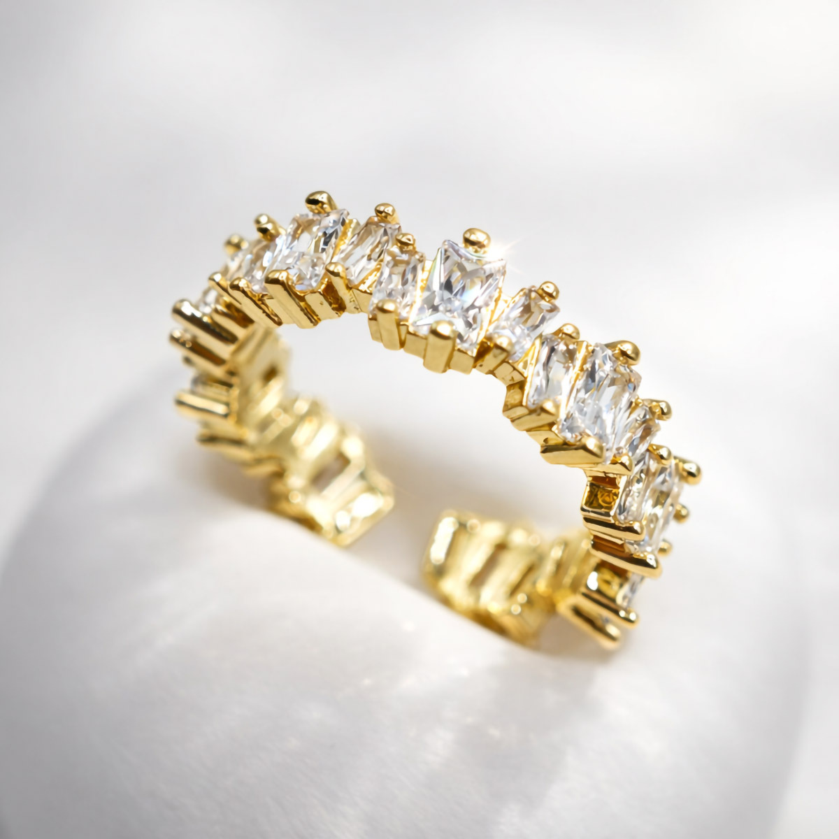 gold-prong-set-cubic-zirconia-open-ring-white-background