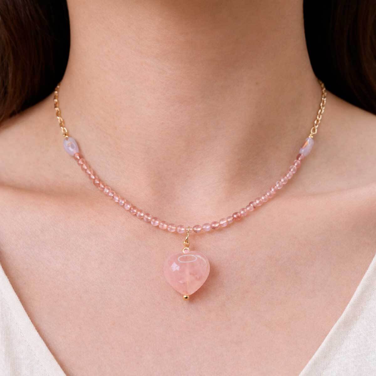 rose-quartz-kunzite-heart-necklace-worn-on-neck