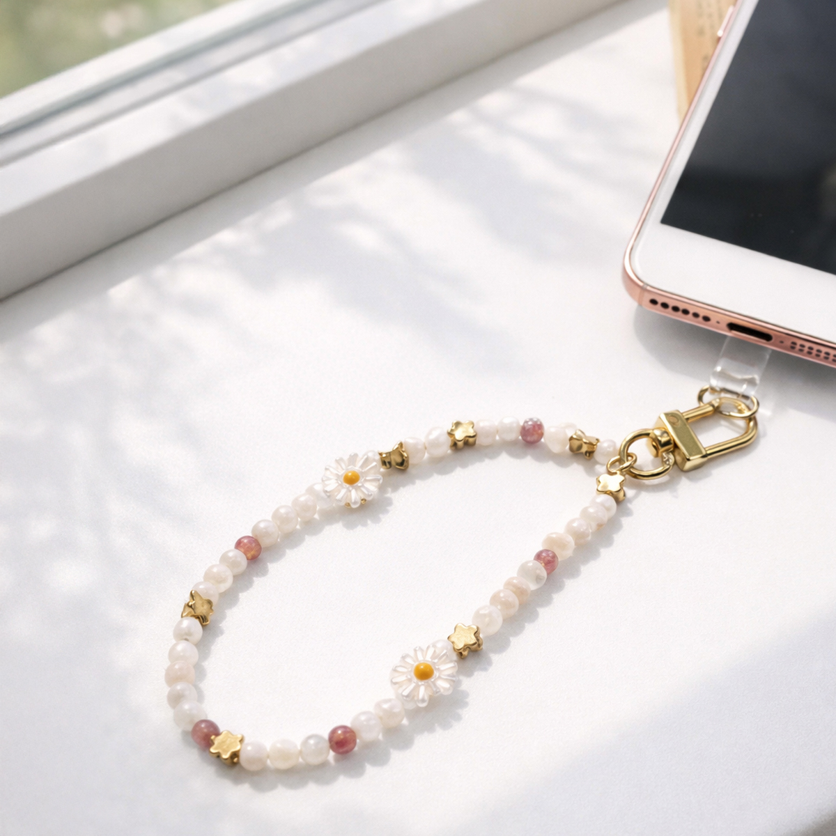 natural-shell-daisy-phone-strap-on-phone