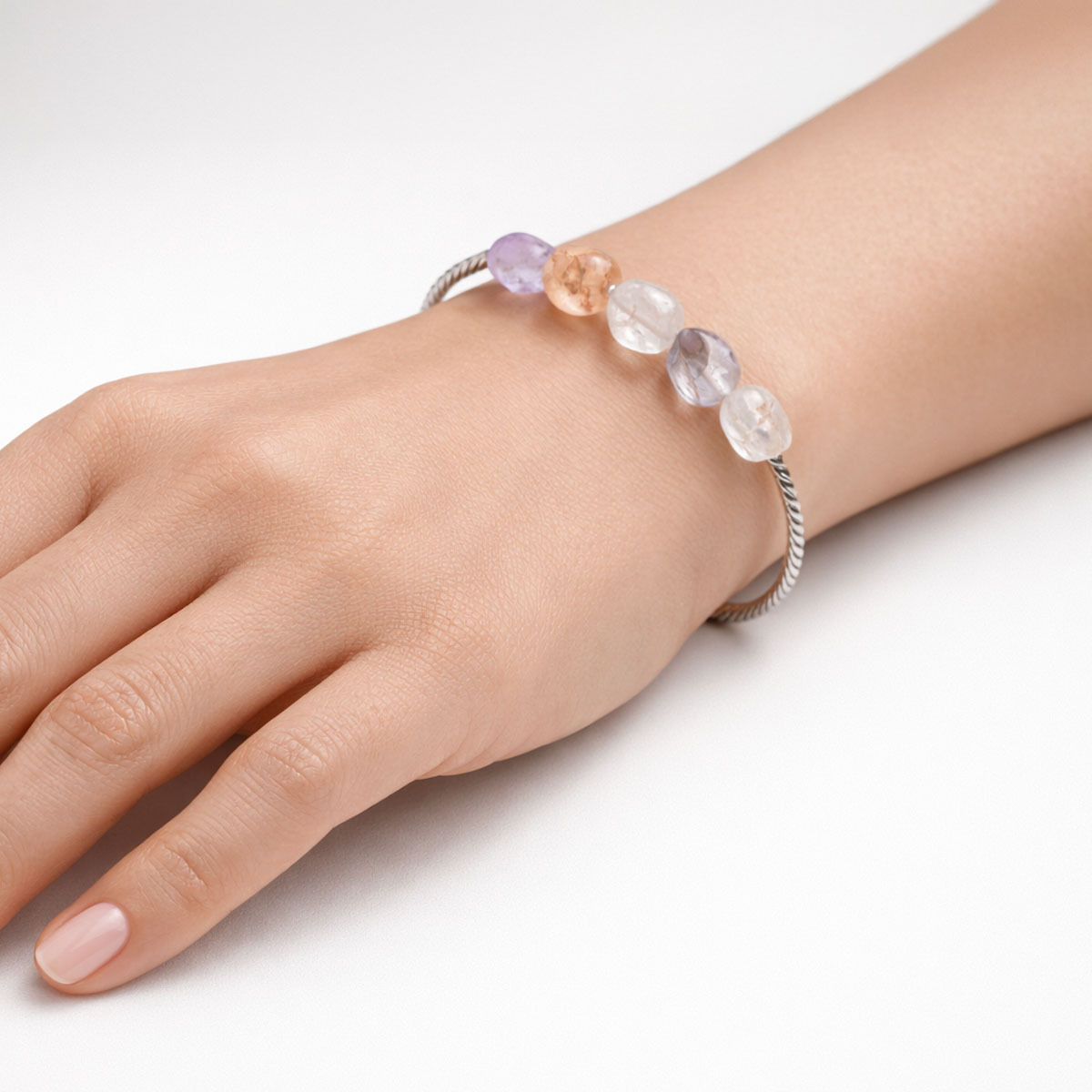 super-seven-raw-crystal-silver-bangle-bracelet-worn-hand