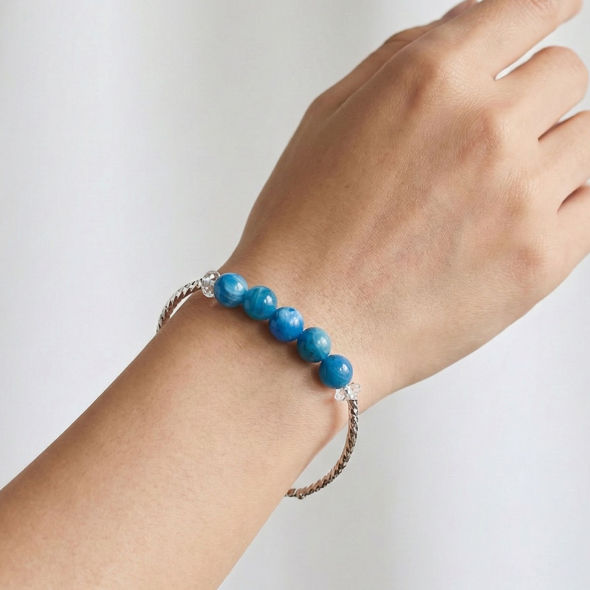 super-seven-raw-crystal-silver-bangle-bracelet-worn-hand-1