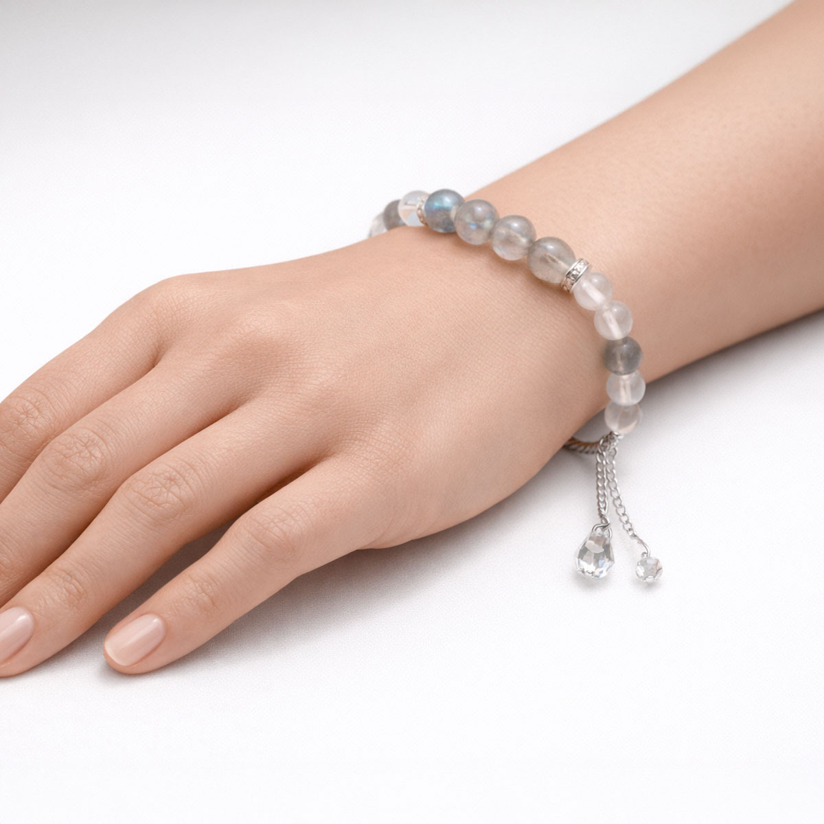 blue-gray-labradorite-silver-ring-bracelet-hand-detail