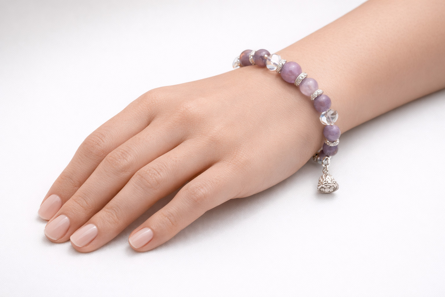 purple-chalcedony-pumpkin-silver-charm-bracelet-hand-closeup