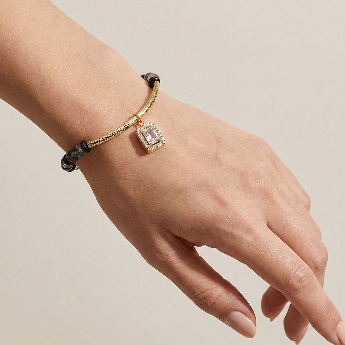 black-rutilated-quartz-gold-bracelet-wear-closeup