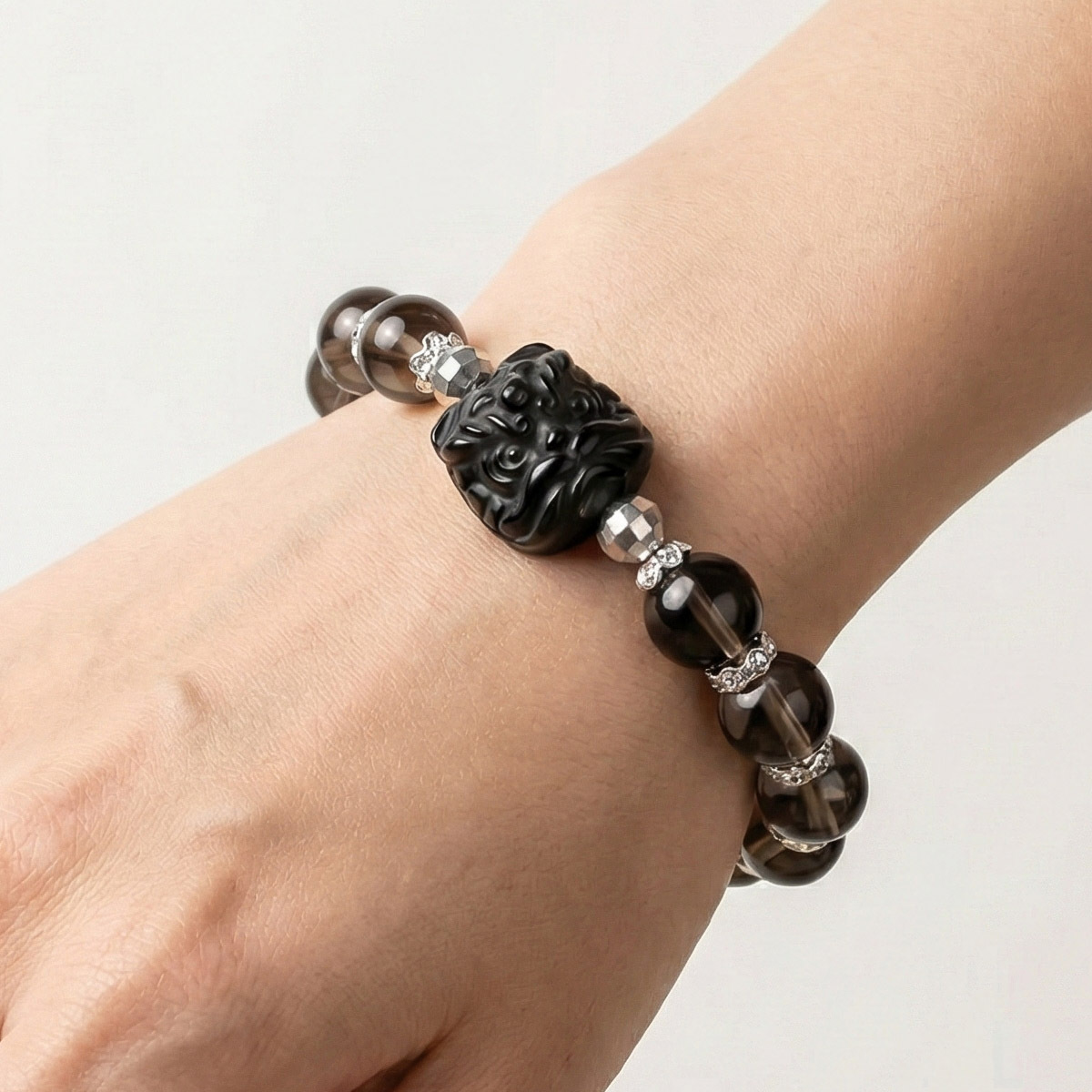 smoky-quartz-pixiu-bracelet-on-hand-detail.