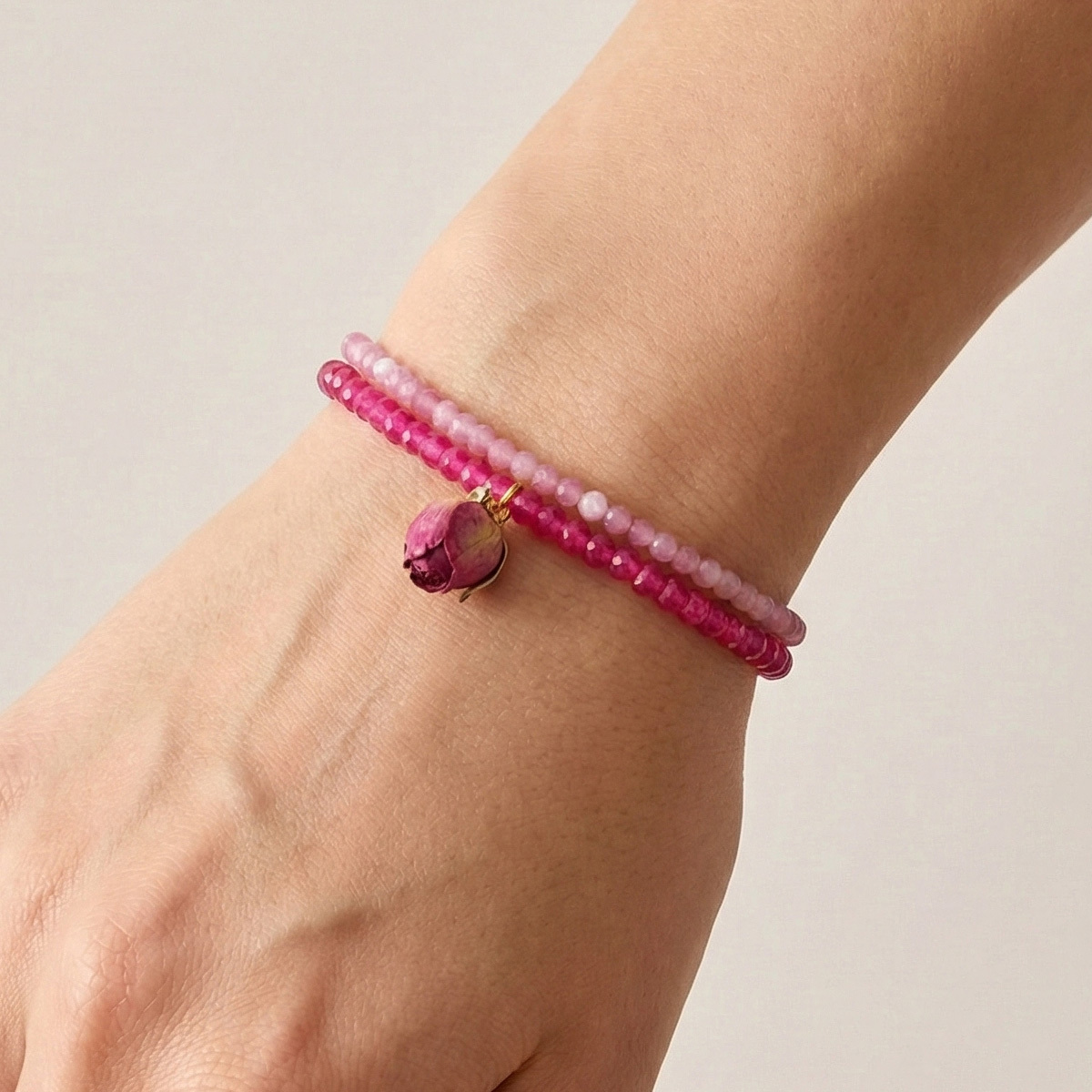 crystal-lepidolite-ruby-bracelet-wearing-hand