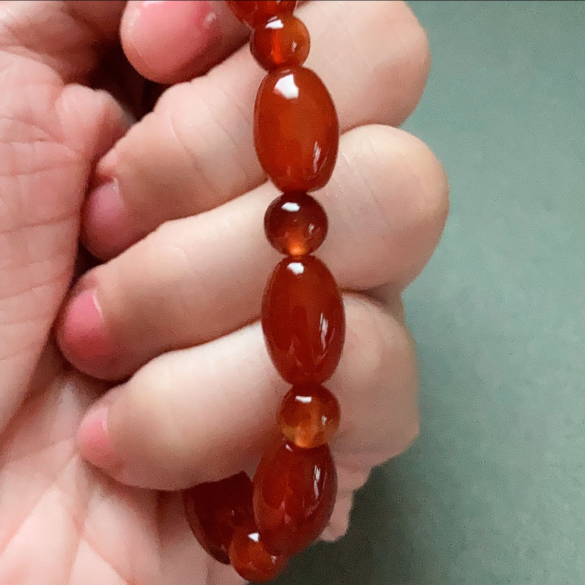 red-agate-oval-bead-bracelet-detail-closeup