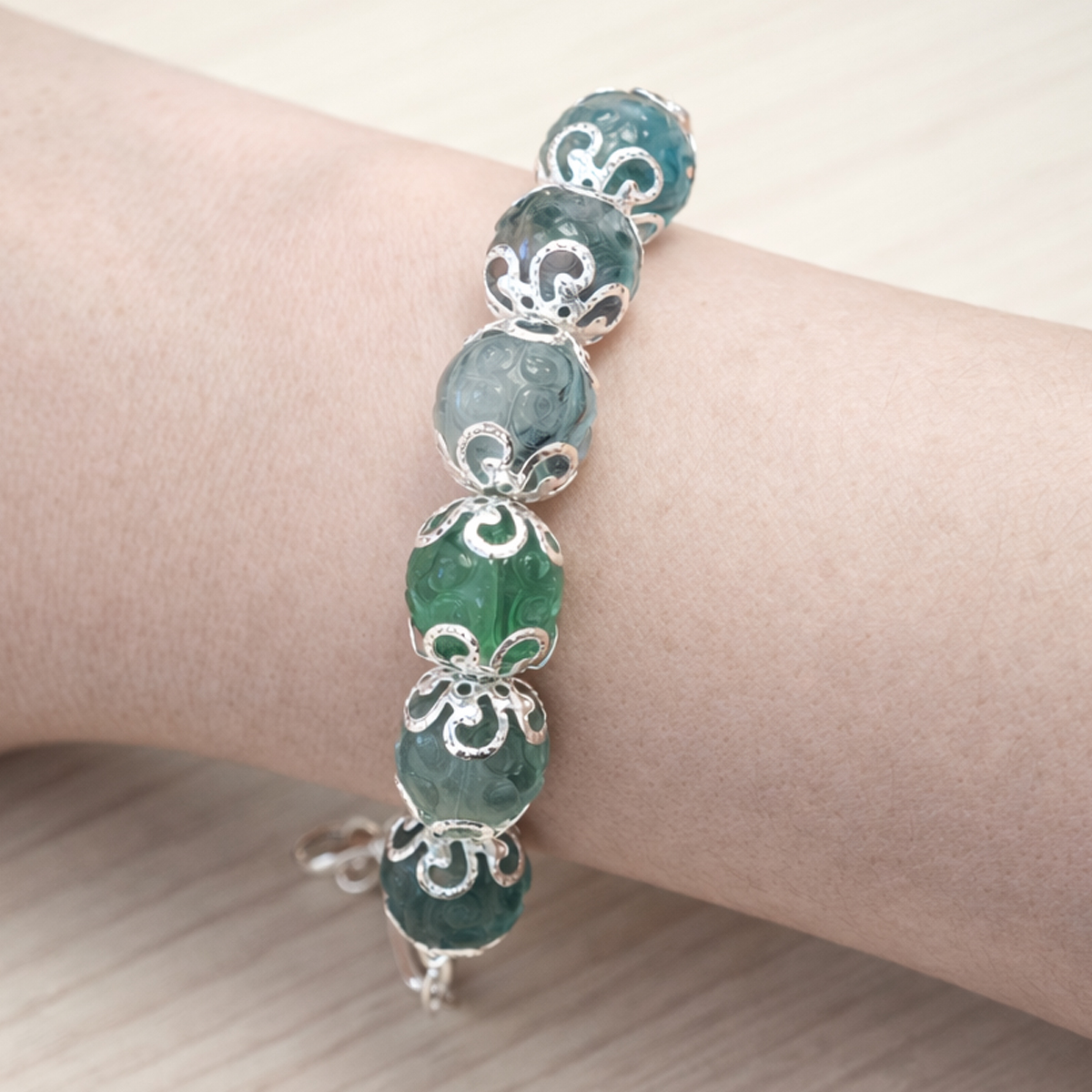 green-fluorite-calm-bracelet-wrist-closeup