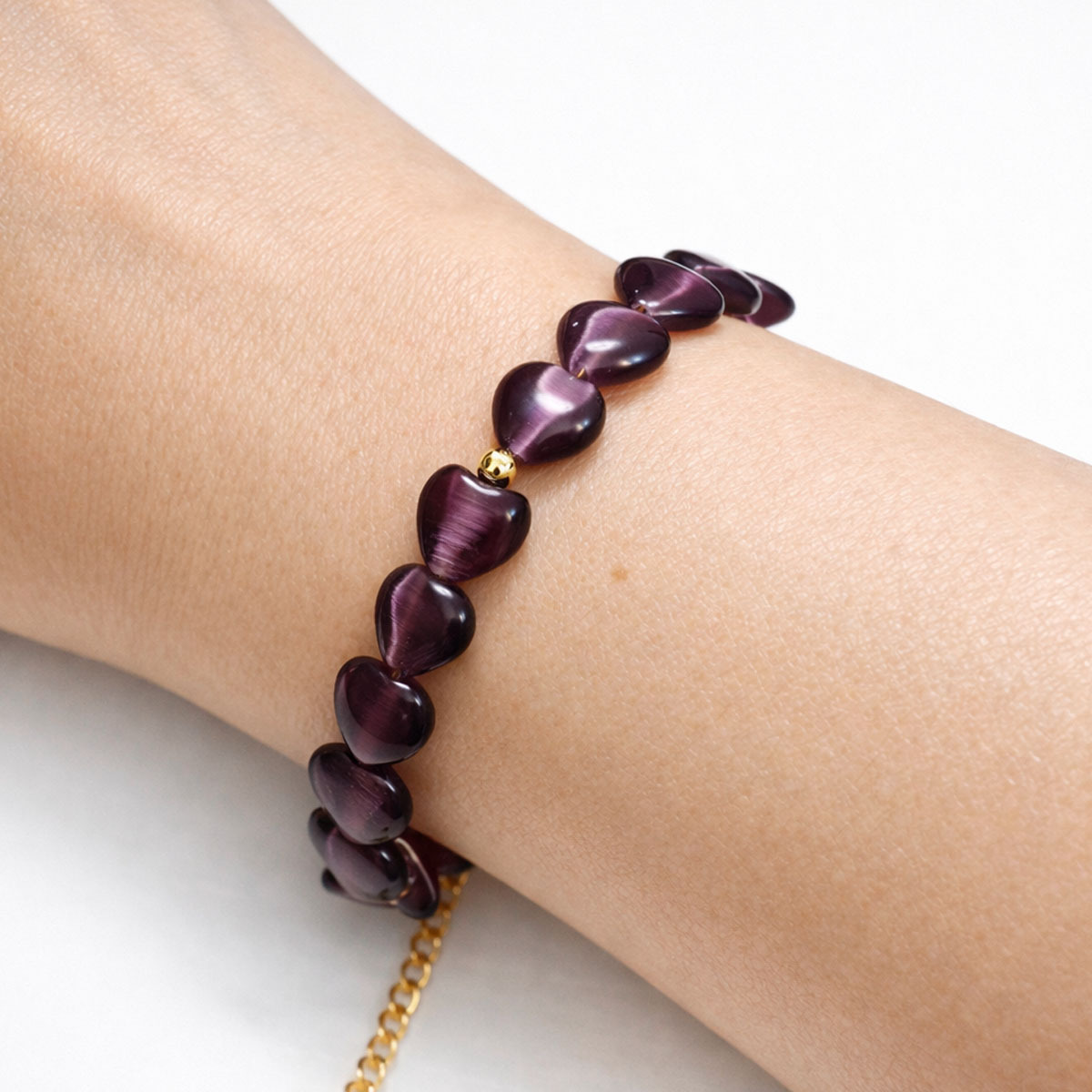 amethyst-cat-eye-heart-bracelet-wearing-closeup