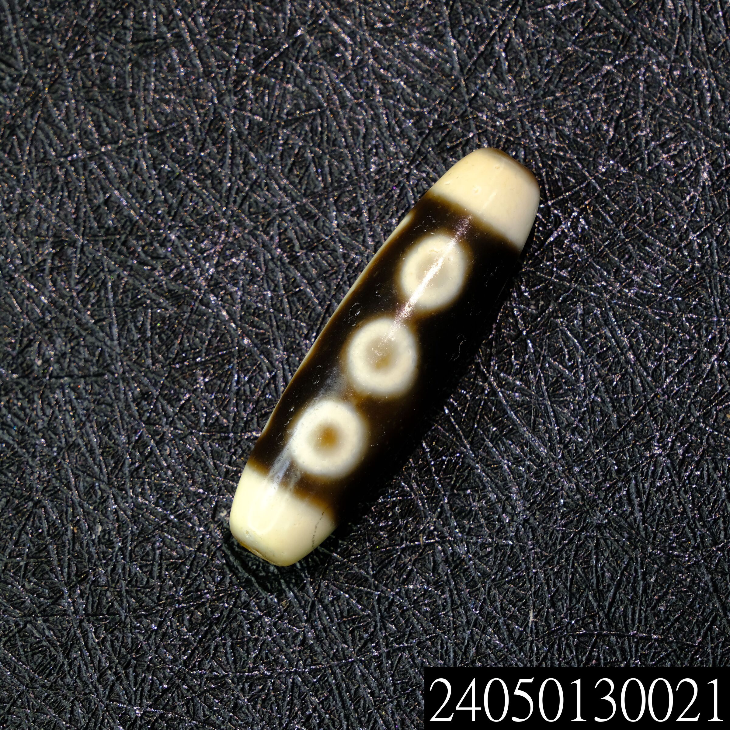 包漿牙黃配方水紋五眼天珠– 添晴天珠文玩龍宮舍利