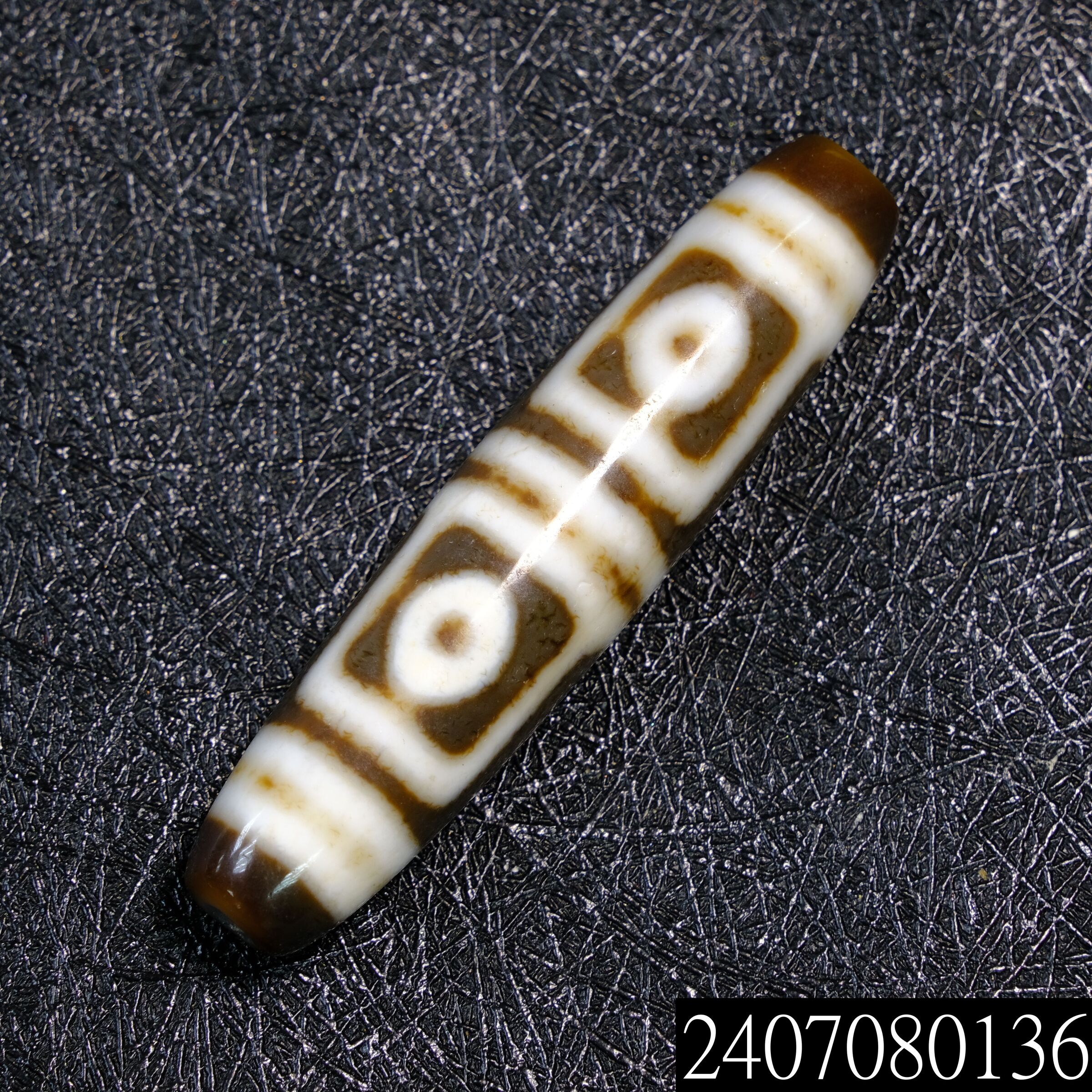 白毫化牙黃老料地門四眼天珠– 添晴天珠文玩龍宮舍利