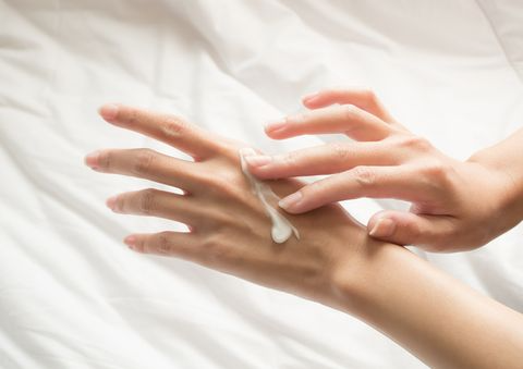 Cropped Image Of Woman Applying Cream At Home 1