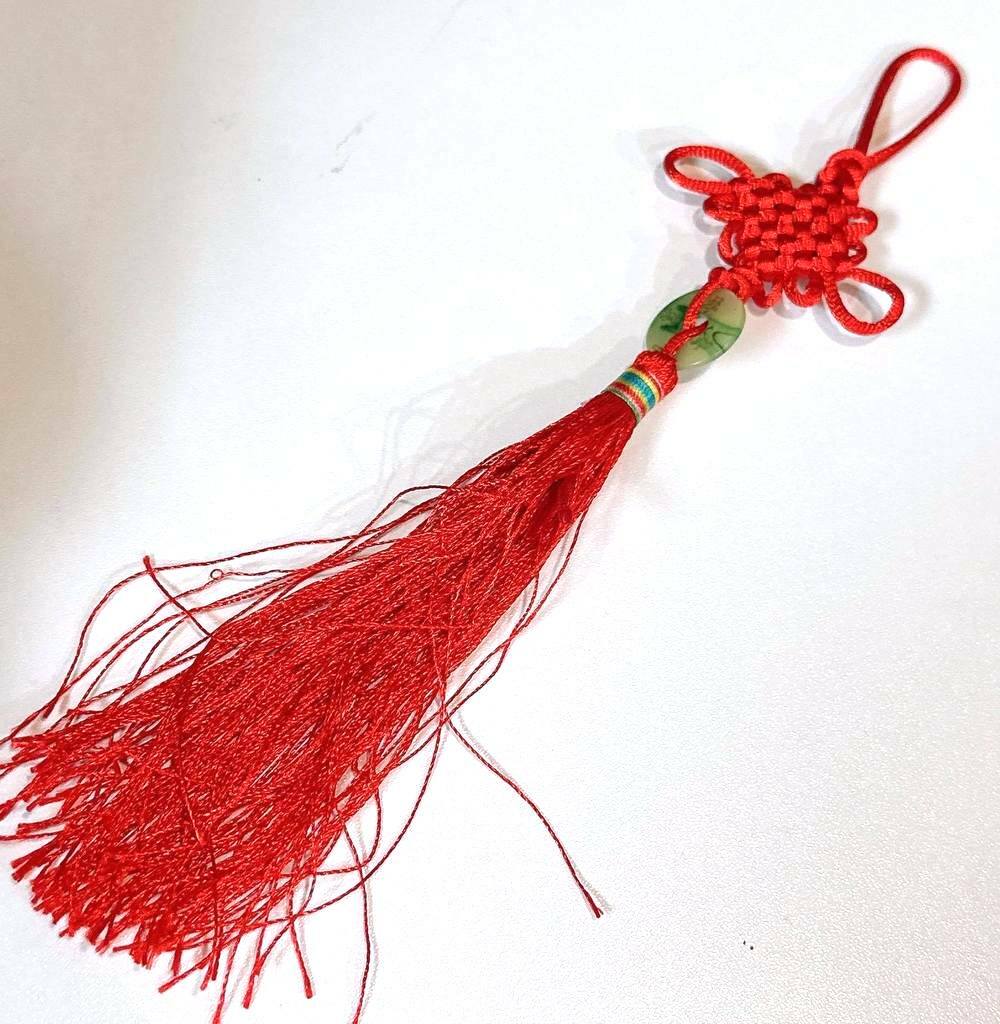 Red tassel with jade