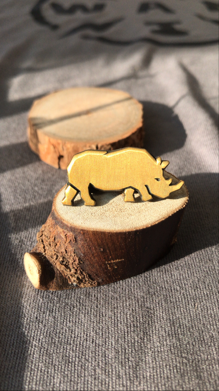 BURA gold enamel rhino pin brooch